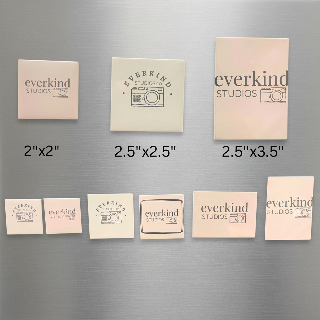 Set of Everkind Studios branded magnets in different sizes on a gray background to demonstrate the variety of sizes